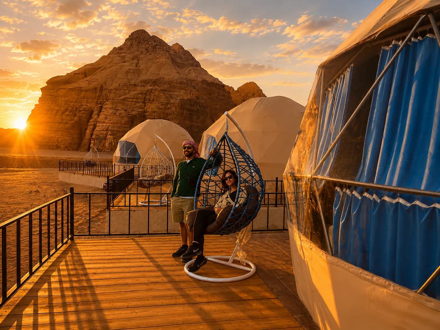 Dome deck and desert seating at Jamal Rum Camp during sunset.